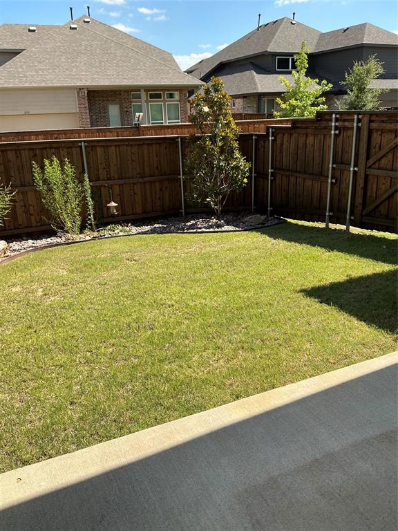 2195 English Ivy Road Frisco, TX 75033 - Photo 19 of 23 Low maintenance landscaped backyard for tenant(s) to maintain...HOA maintains the front lawn.