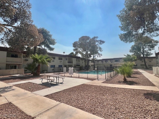 5346 South Swenson Street, Unit 35 Las Vegas, NV 89119 - Photo 19 of 19 Community pool featuring a patio