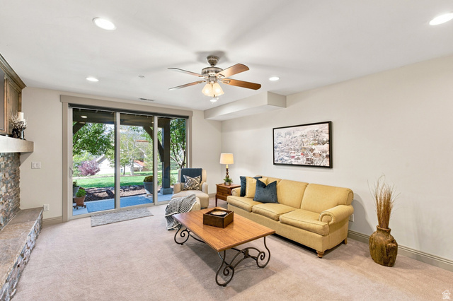 5207 North Oldgate Road Heber City, UT 84032 - Photo 27 of 58 Recessed lighting, ceiling fan, and sliding glass doors to the exterior patio