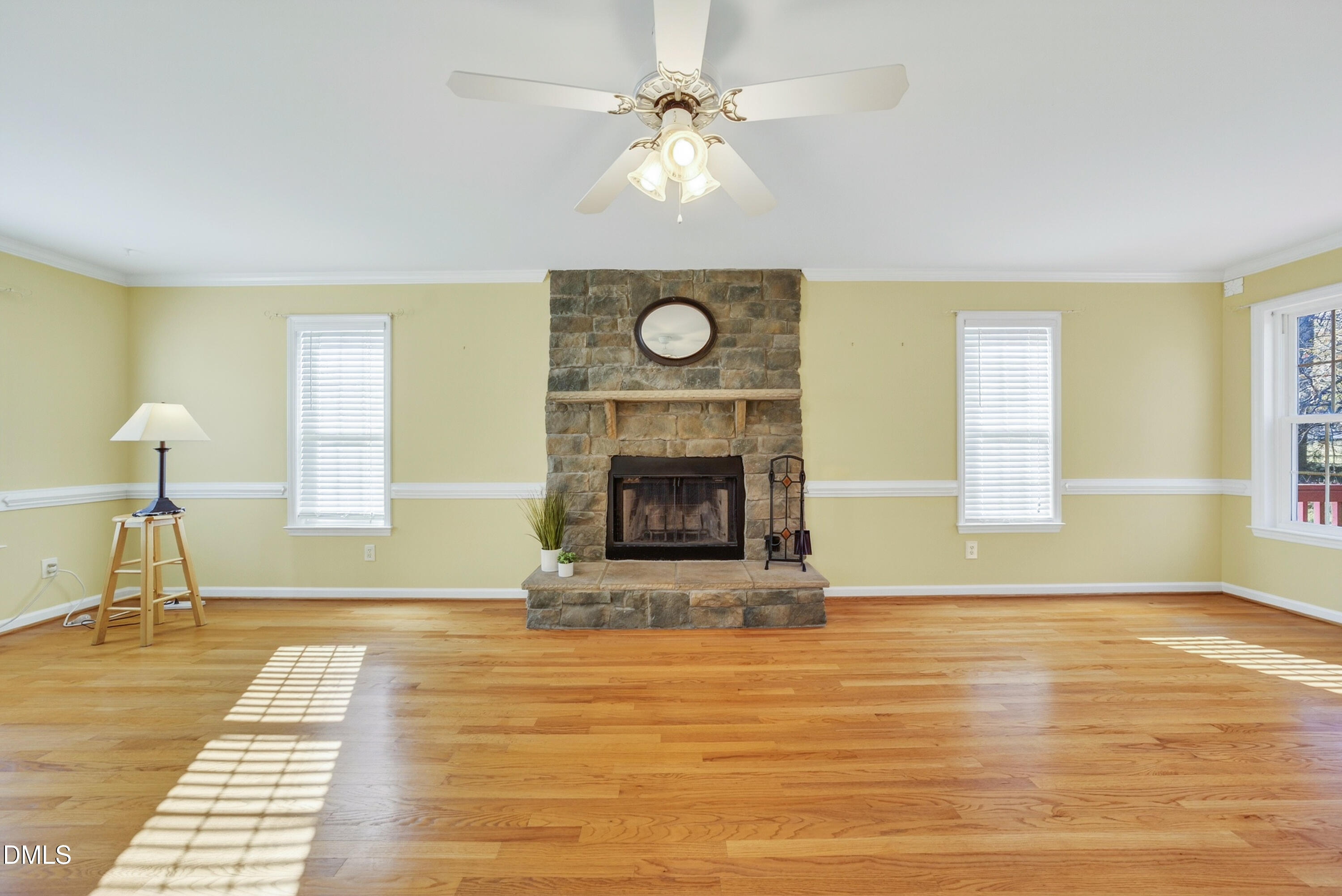 8724 Highmore Trail Raleigh, NC 27603 - Photo 12 of 39 Family Room (13.4 x 27.3) with wood burning stone fireplace never used by seller.