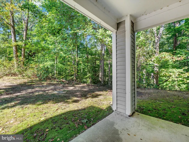 a house with yard in front of it