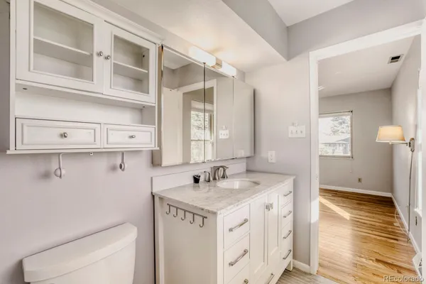 a view of bathroom with dual sinks
