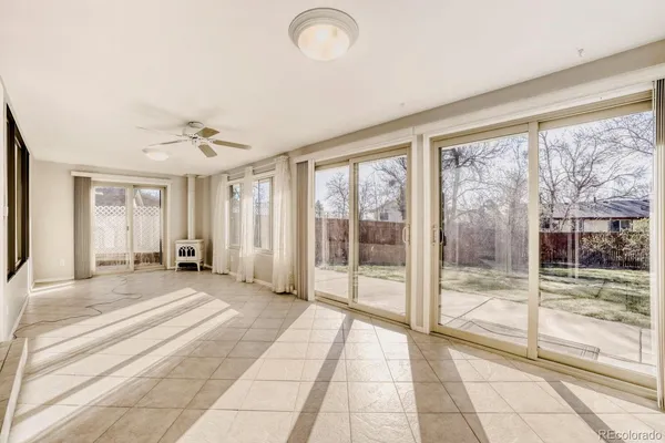 a view of a room with window and hardwood floor