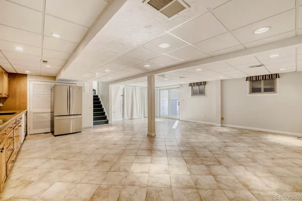 a view of an empty room with an entryway