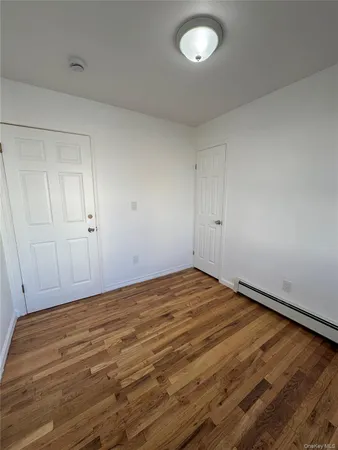 wooden floor and cabinet in a room