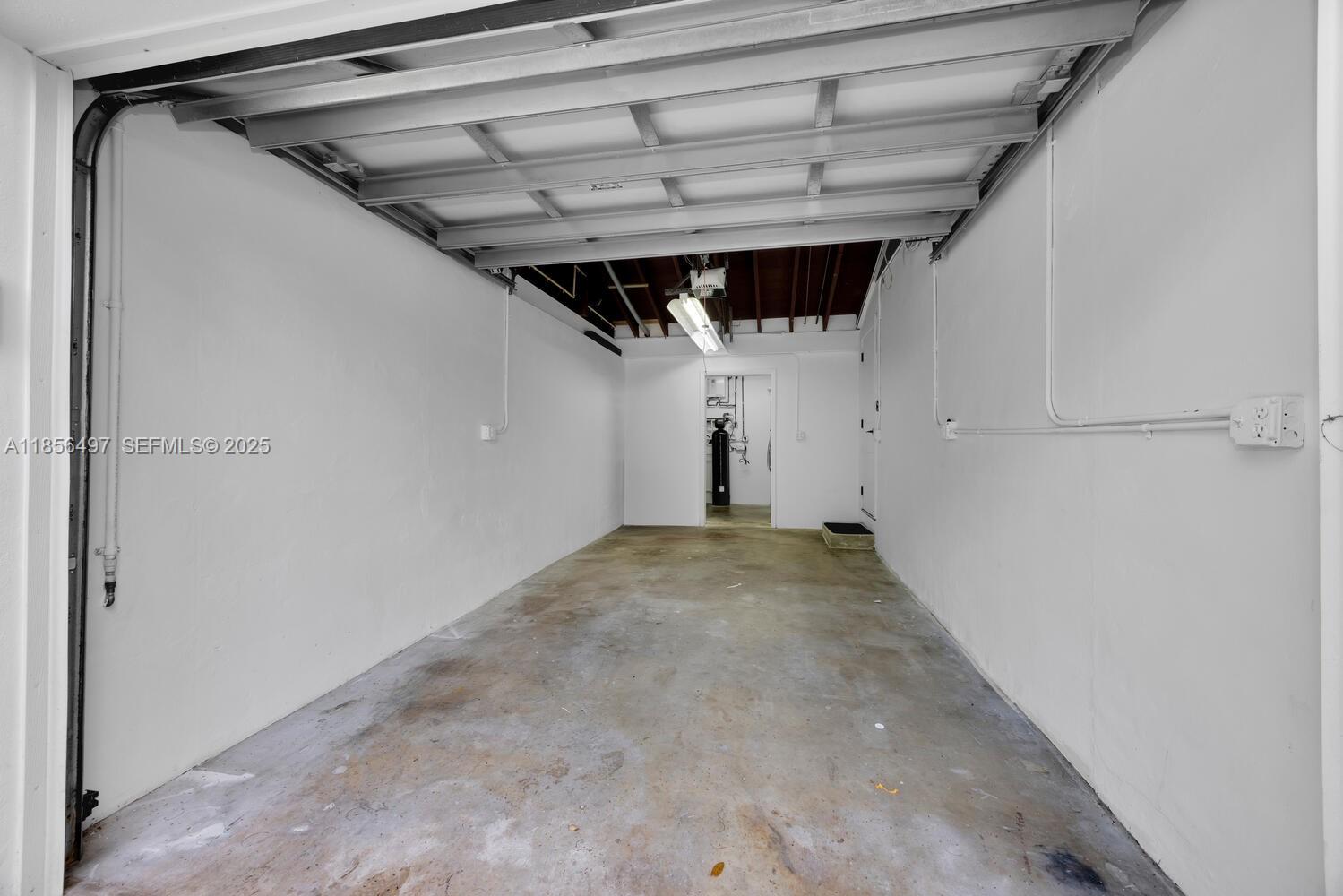 5827 Southwest 69th Court Miami, FL 33143 - Photo 15 of 18 a view of a garage