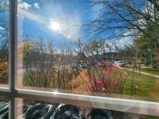 a view of a lake from a balcony