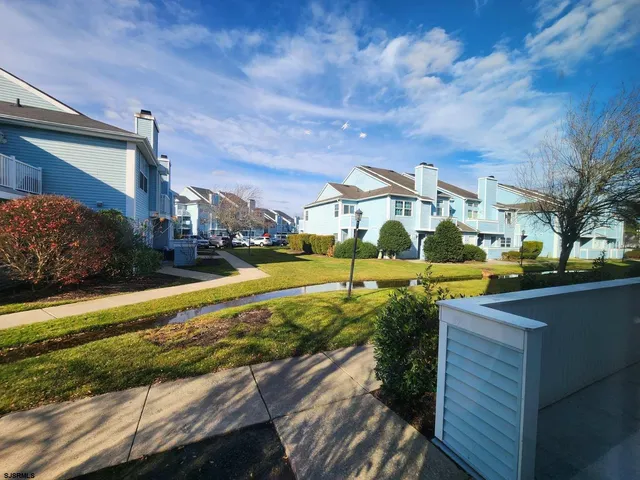 a view of a house with a swimming pool