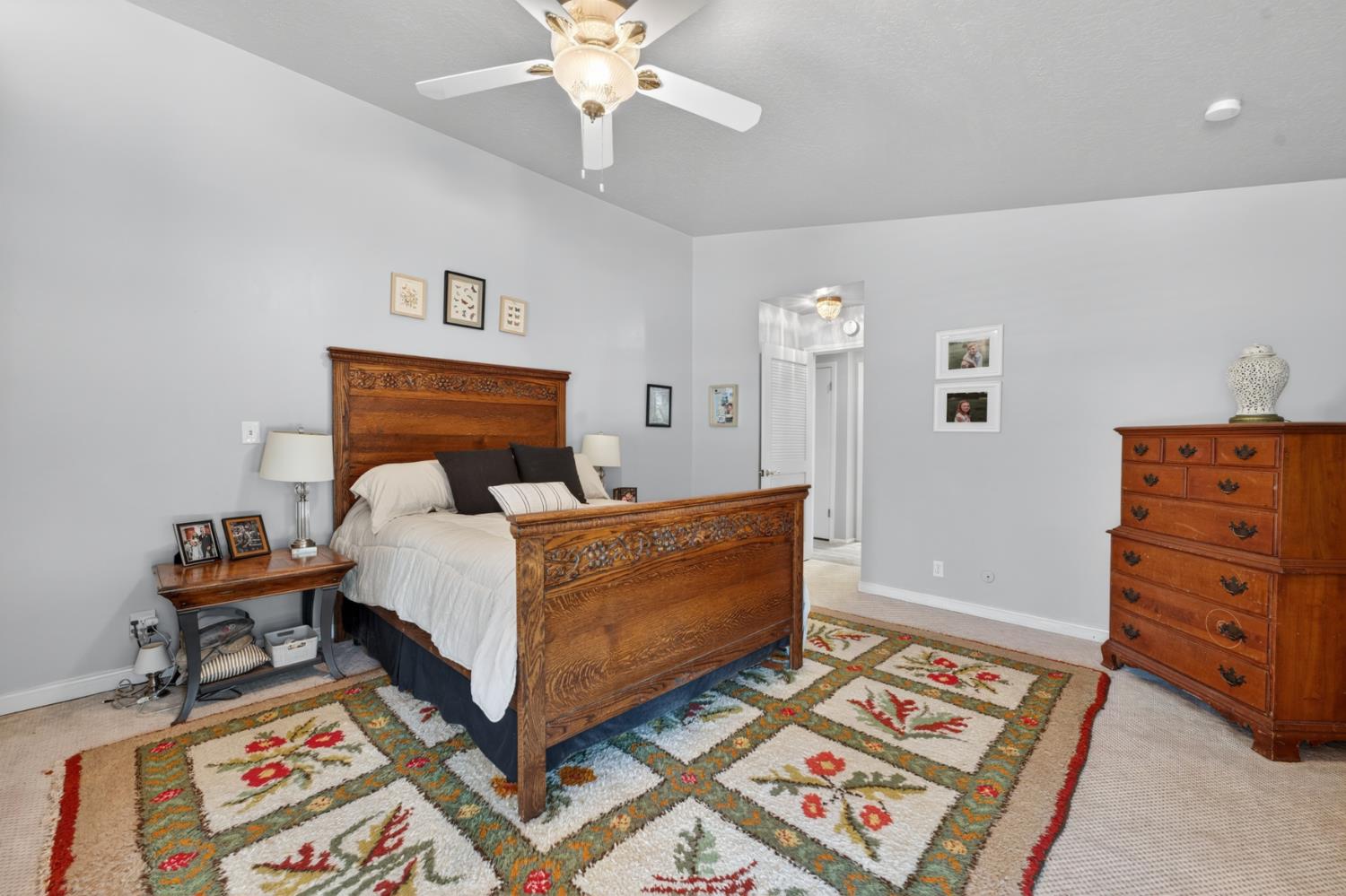 1880 Magnolia Street Gridley, CA 95948 - Photo 35 of 95 a bed room with a bed and a lamp on dresser