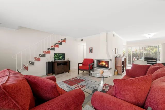 a living room with furniture and a living room