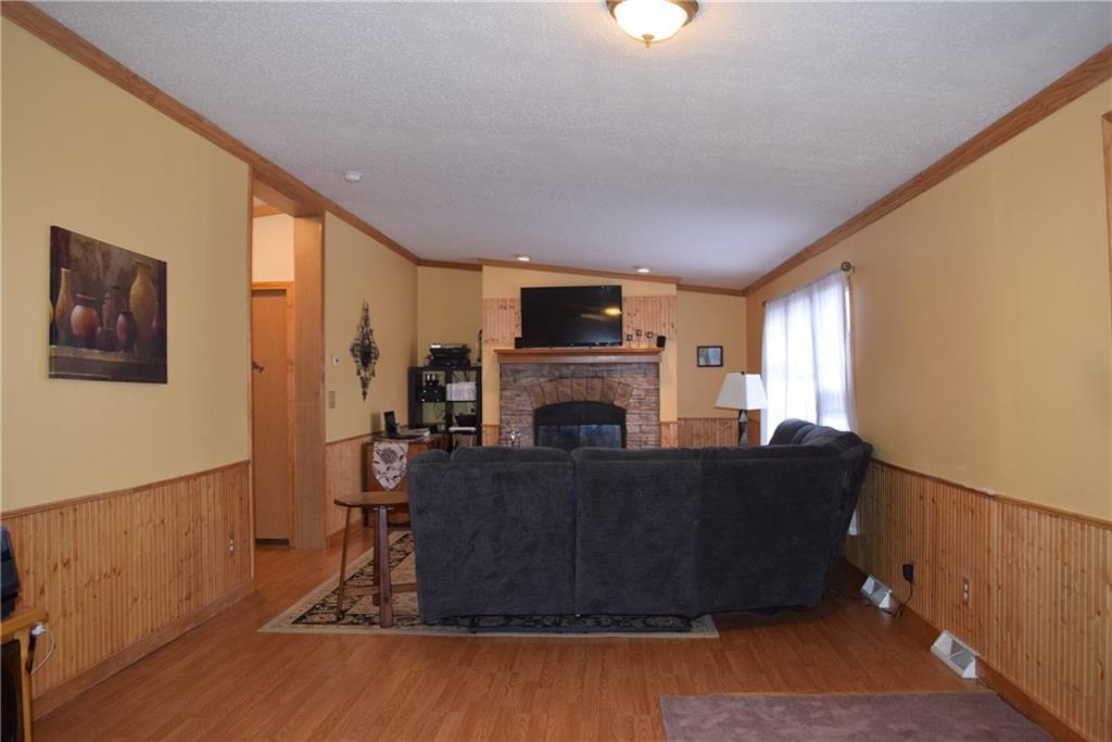 37 Brock Road Searsport, ME 04974 - Photo 14 of 15 Living room with fireplace
