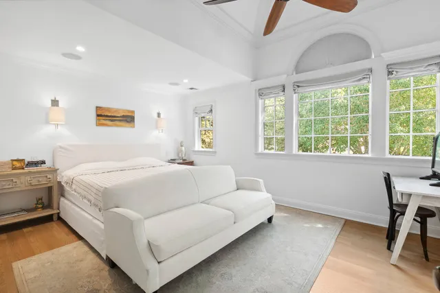 a room with a bed and a chair