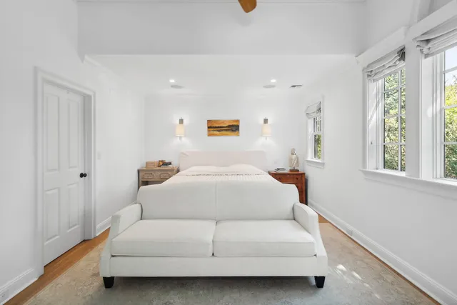 a bed room with a bed and a window