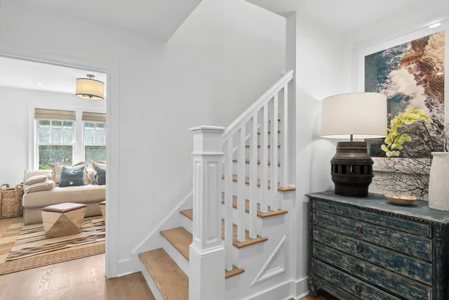 a view of living room filled with furniture and a window