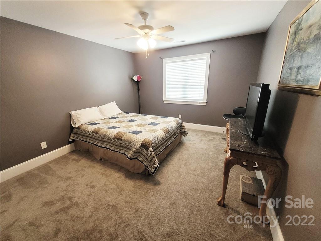 679 Presbyterian Road Mooresville, NC 28115 - Photo 14 of 25 a bedroom with bed and a window