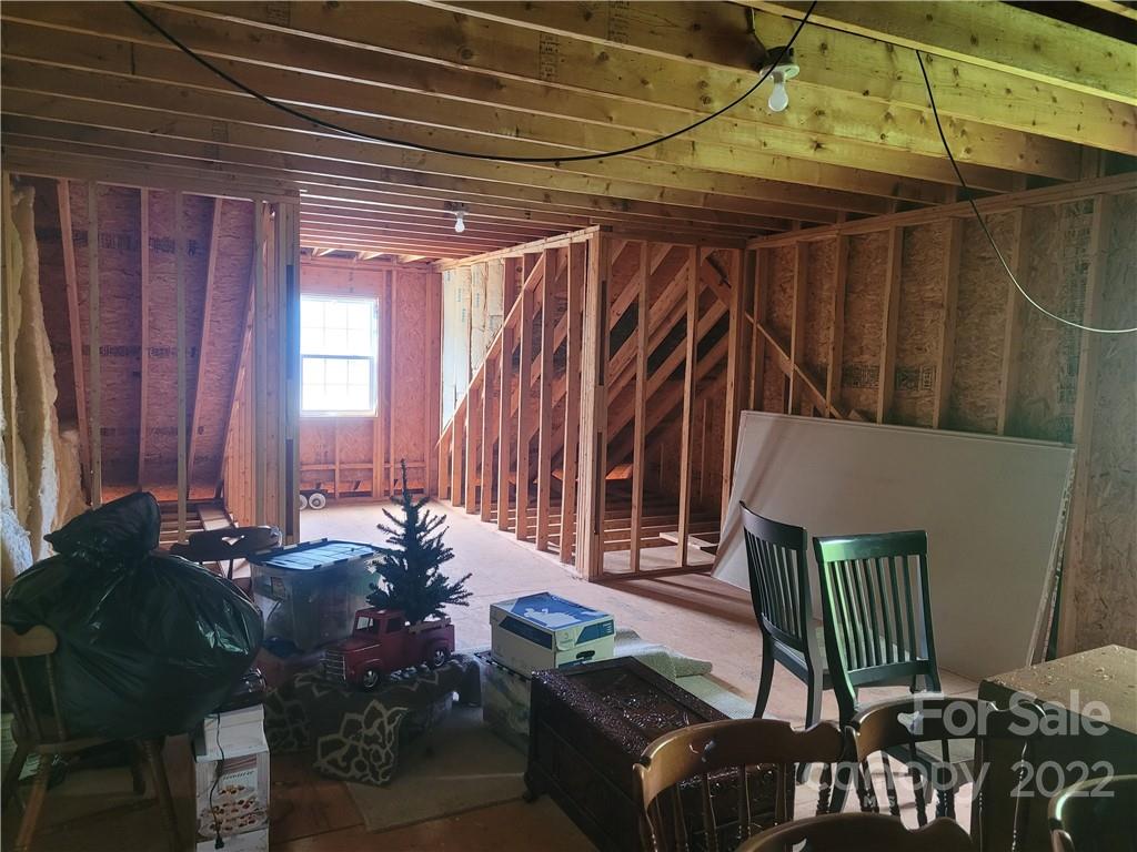 679 Presbyterian Road Mooresville, NC 28115 - Photo 17 of 25 a balcony with furniture and wooden floor