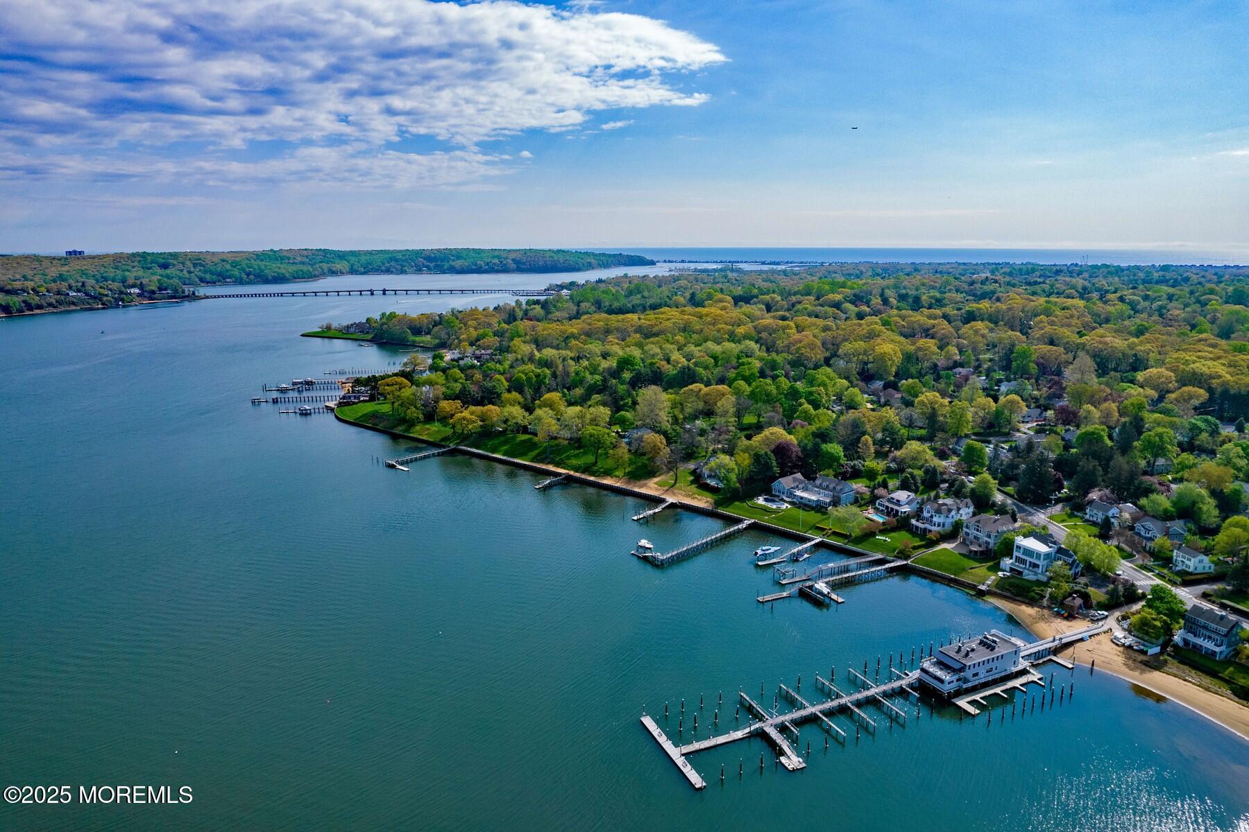281 Hance Road Fair Haven, NJ 07704 - Photo 3 of 14 an aerial view of a golf course with houses