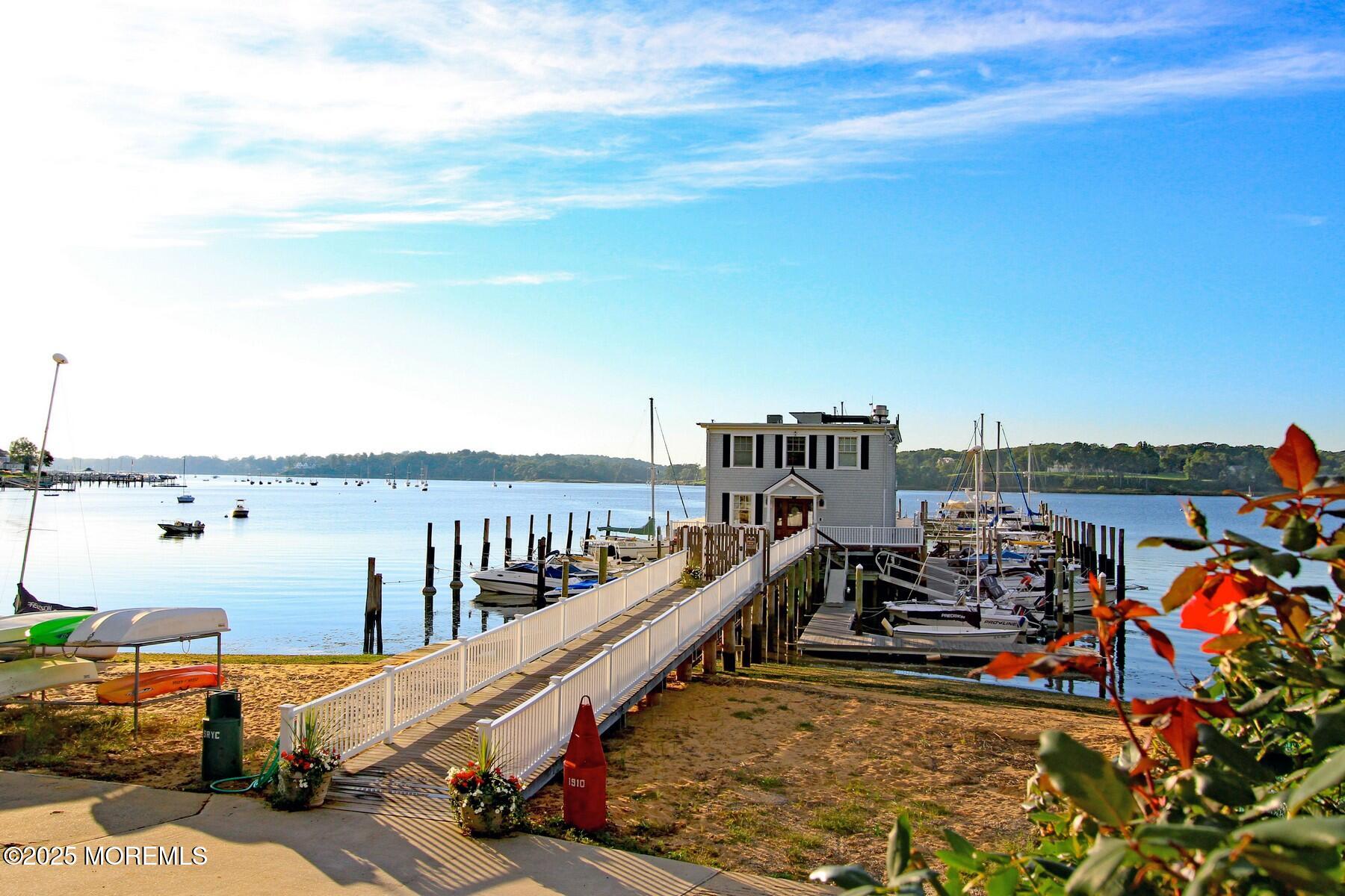 281 Hance Road Fair Haven, NJ 07704 - Photo 9 of 14 a view of roof deck with two couches and wooden floor
