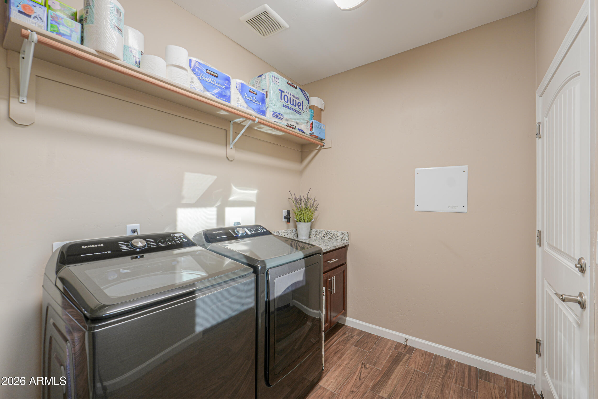 1487 South Mountain View Road Apache Junction, AZ 85119 - Photo 26 of 60 a utility room with dryer and washer