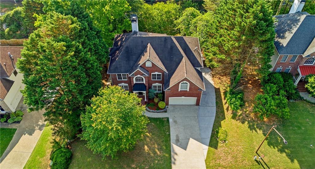 110 Mayes Farm Road Northwest Marietta, GA 30064 - Photo 3 of 49 an aerial view of a house with a yard