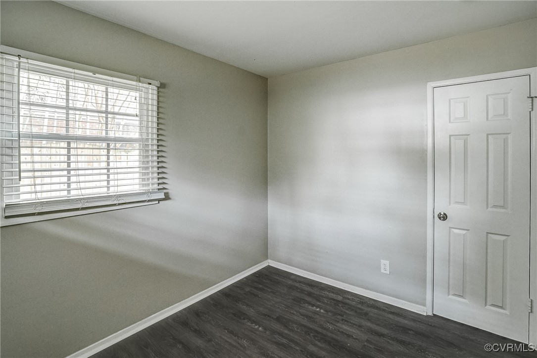 1305 Wembly Road Henrico, VA 23229 - Photo 23 of 28 Spare room with dark hardwood / wood-style floors