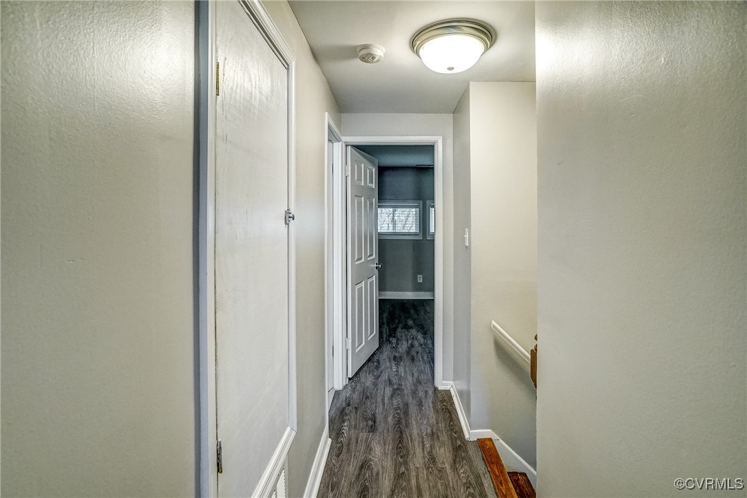 1305 Wembly Road Henrico, VA 23229 - Photo 24 of 28 Corridor featuring dark hardwood / wood-style floo