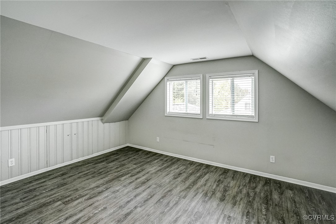 1305 Wembly Road Henrico, VA 23229 - Photo 25 of 28 Bonus room featuring vaulted ceiling and dark hard