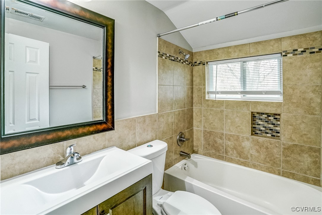 1305 Wembly Road Henrico, VA 23229 - Photo 28 of 28 Full bathroom with lofted ceiling, toilet, vanity,