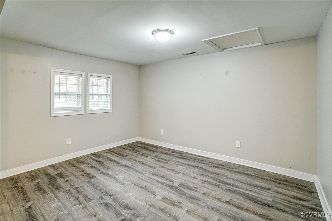 1305 Wembly Road Henrico, VA 23229 - Photo 9 of 28 Unfurnished room with light hardwood / wood-style