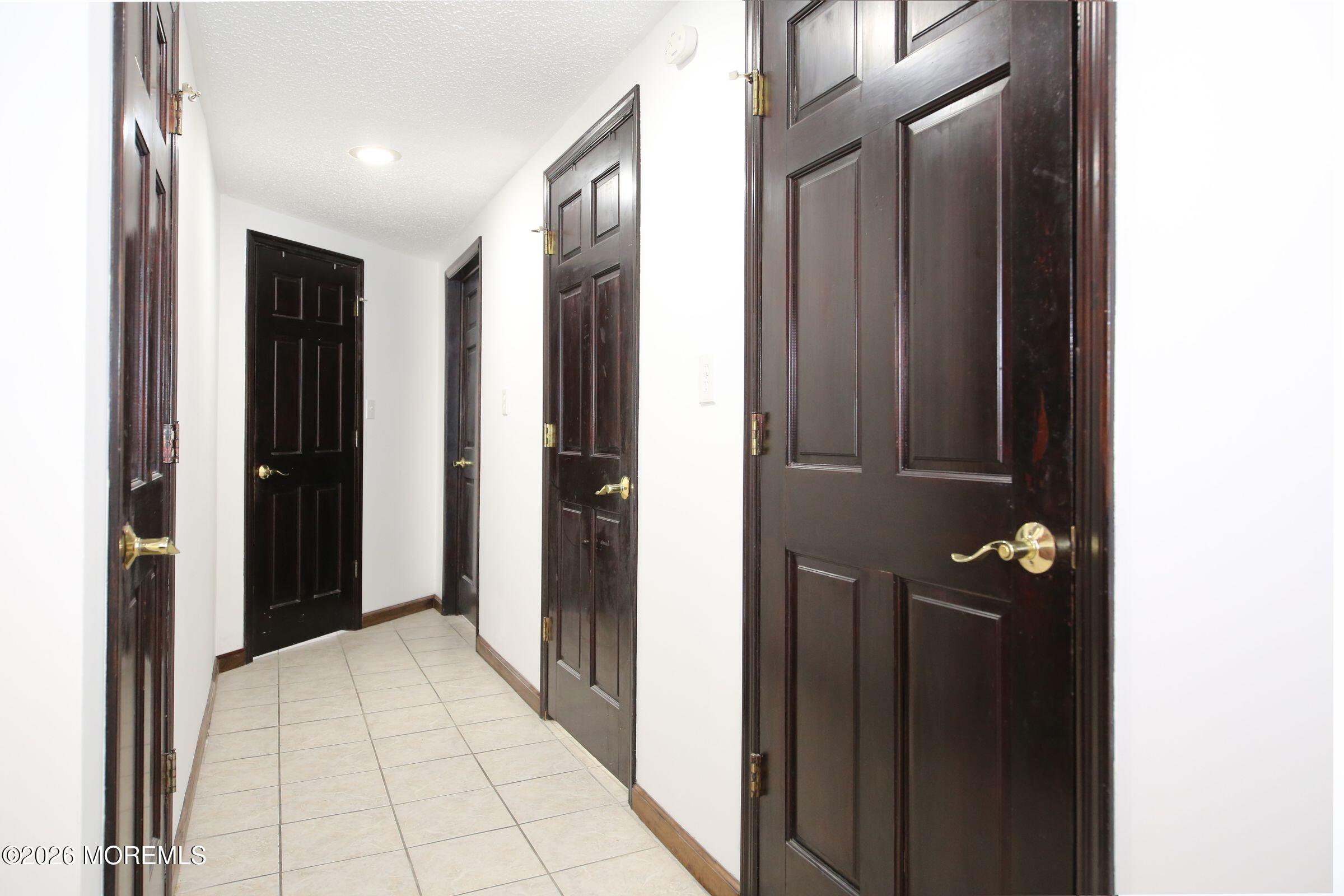 60 Matthew Street, Unit 1 Highlands, NJ 07732 - Photo 13 of 33 a view of a hallway with wooden floor