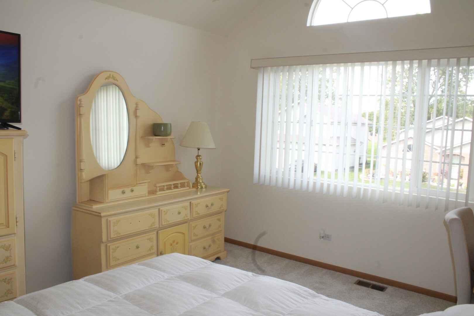 613 Farmview Road University Park, IL 60484 - Photo 17 of 22 a bedroom with a bed and a mirror