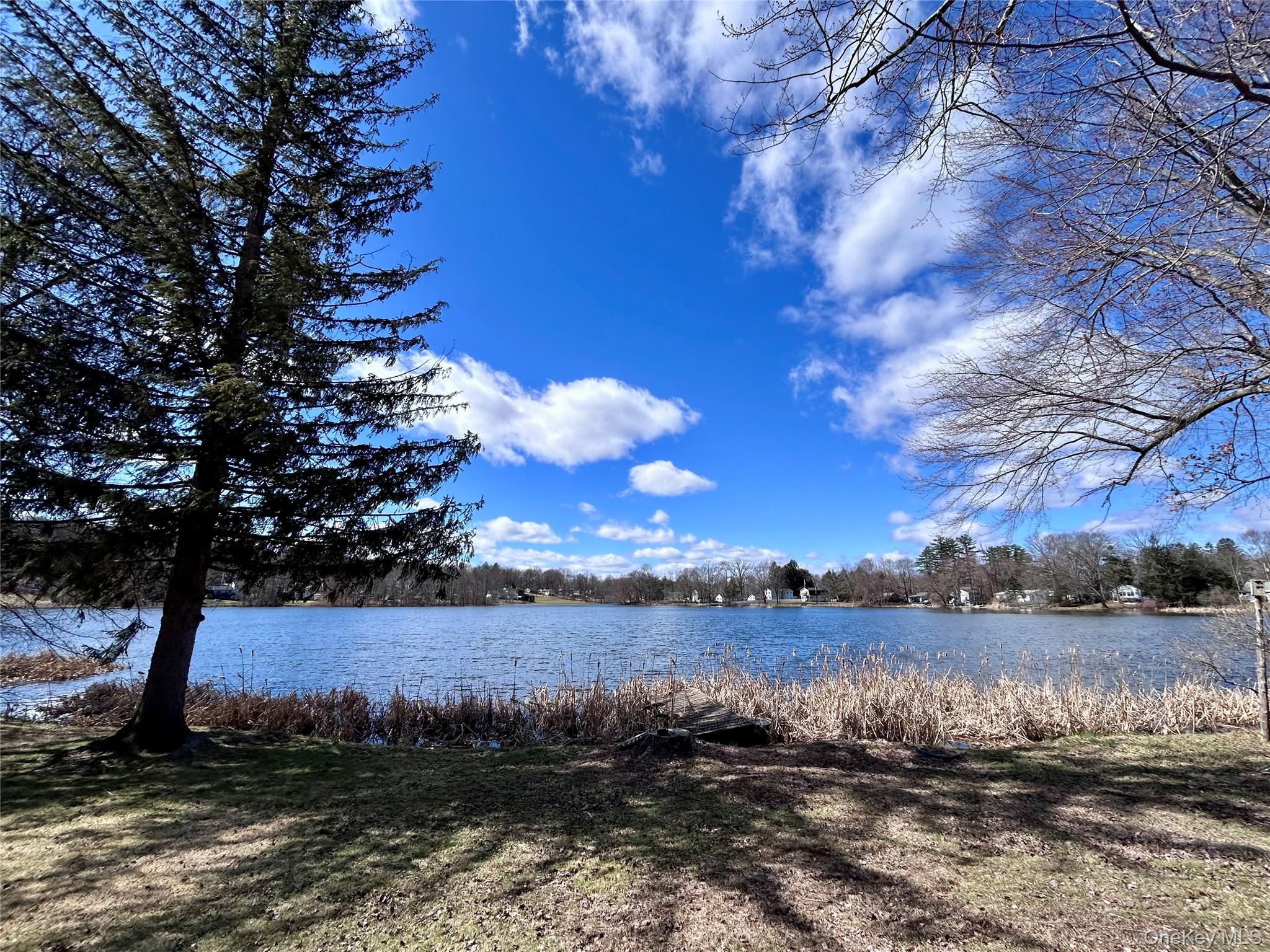 759 North Hillside Road Wappingers Falls, NY 12590 - Photo 6 of 13 a view of a lake with houses in the back