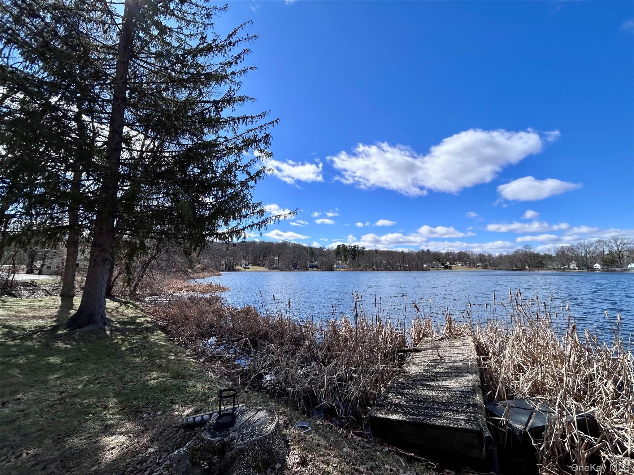 759 North Hillside Road Wappingers Falls, NY 12590 - Photo 7 of 13 a view of a lake next to a building