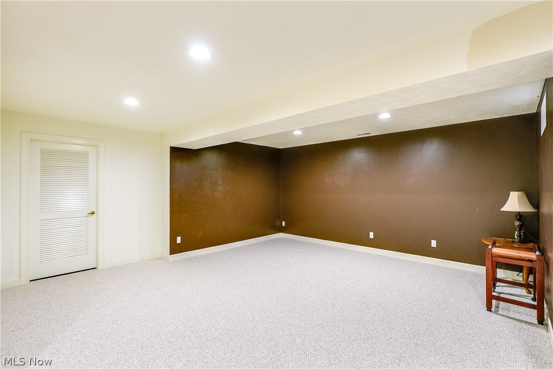 4561 Ridgestone Way Medina, OH 44256 - Photo 36 of 50 View of carpeted empty room and access to a large storage area.