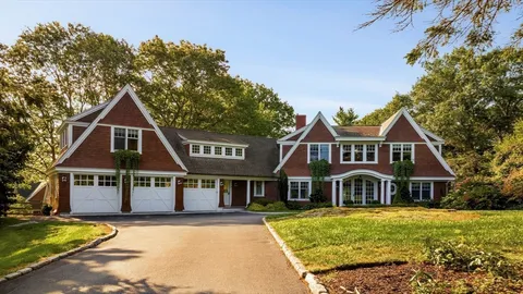 a front view of a house with yard