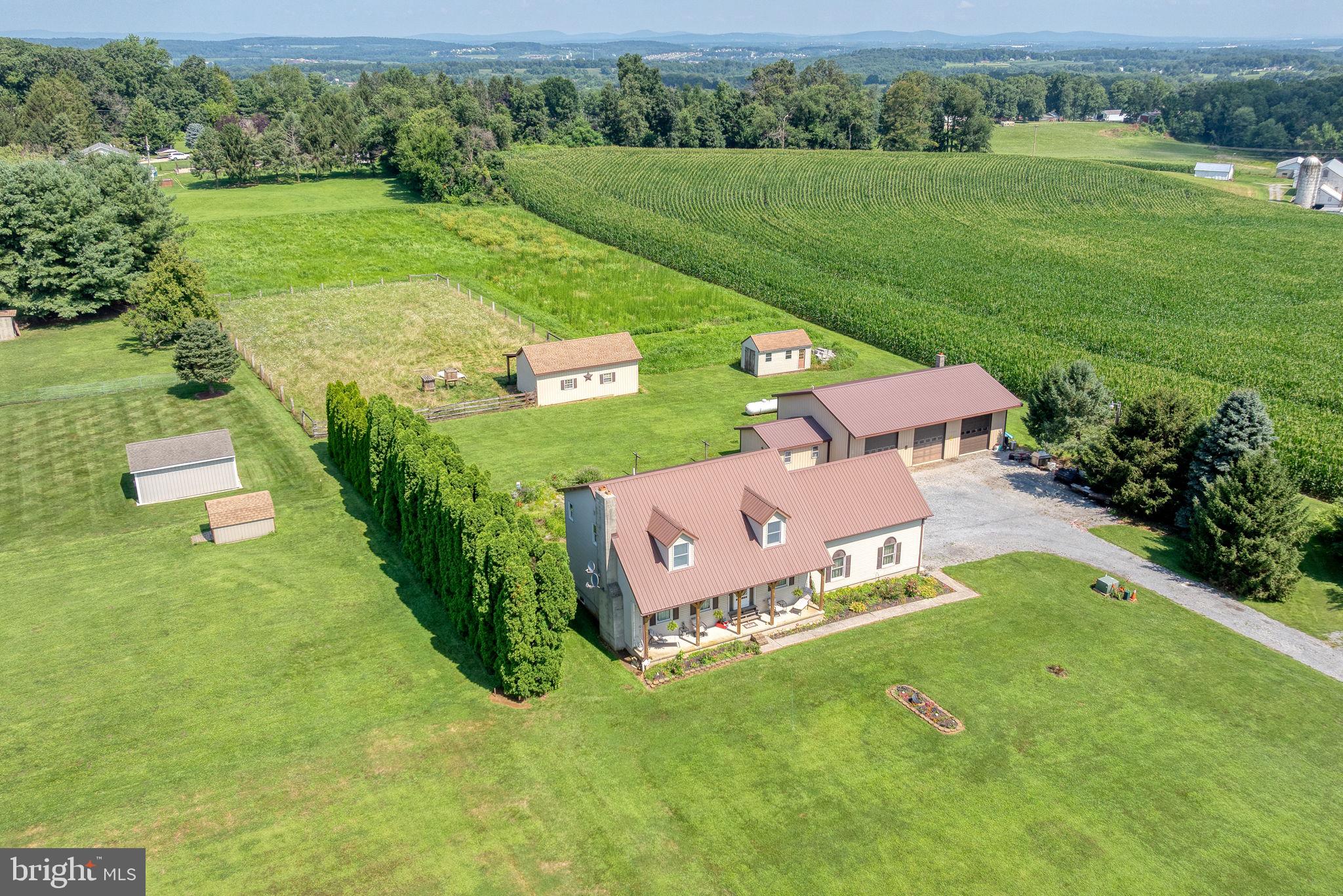 5363 Waltersdorff Road Spring Grove, PA 17362 - Photo 8 of 66 an aerial view of a house with pool big yard and large trees
