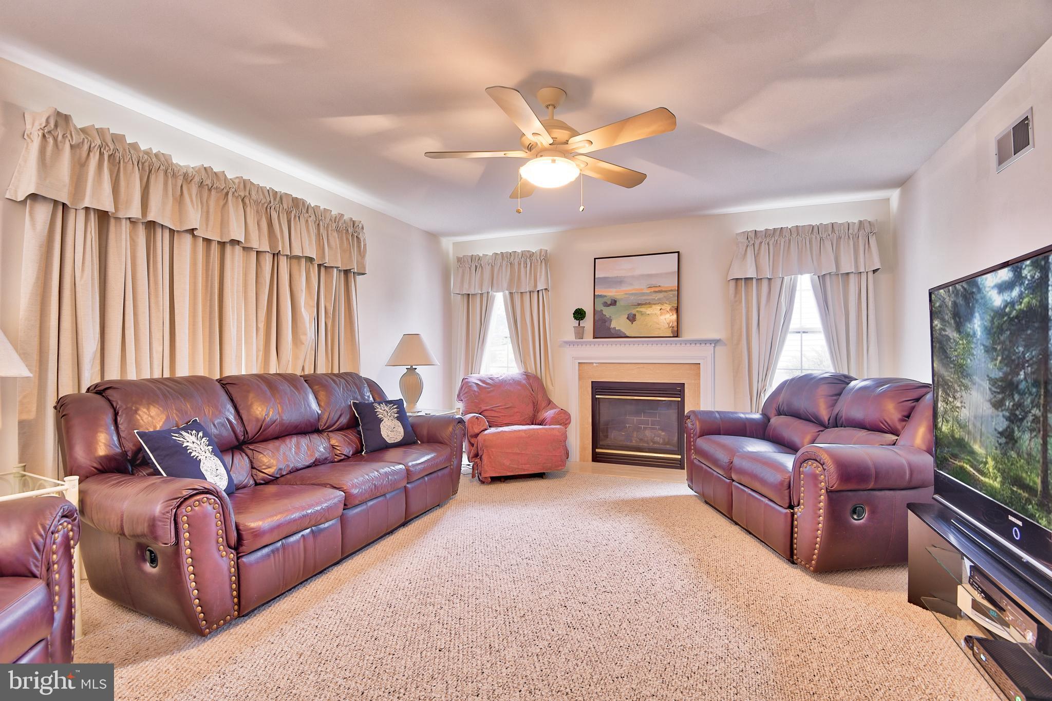 215 Runningboard Road Stewartstown, PA 17363 - Photo 11 of 30 Family Room with Gas Fireplace