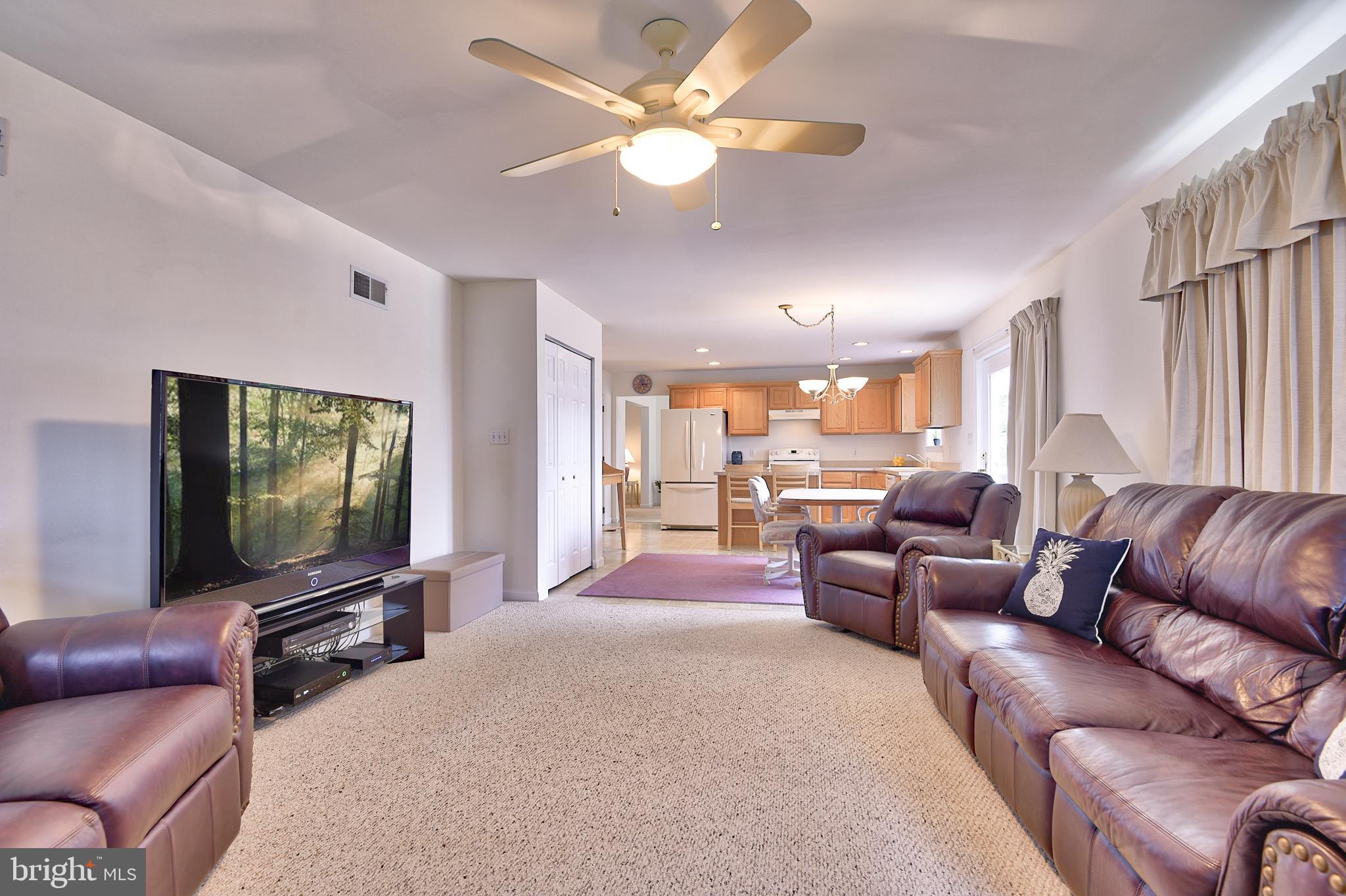 215 Runningboard Road Stewartstown, PA 17363 - Photo 10 of 30 Family Room Opens to Kitchen