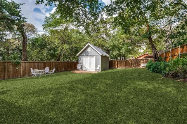 a house view with a garden space