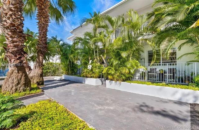 a view of a street with a building