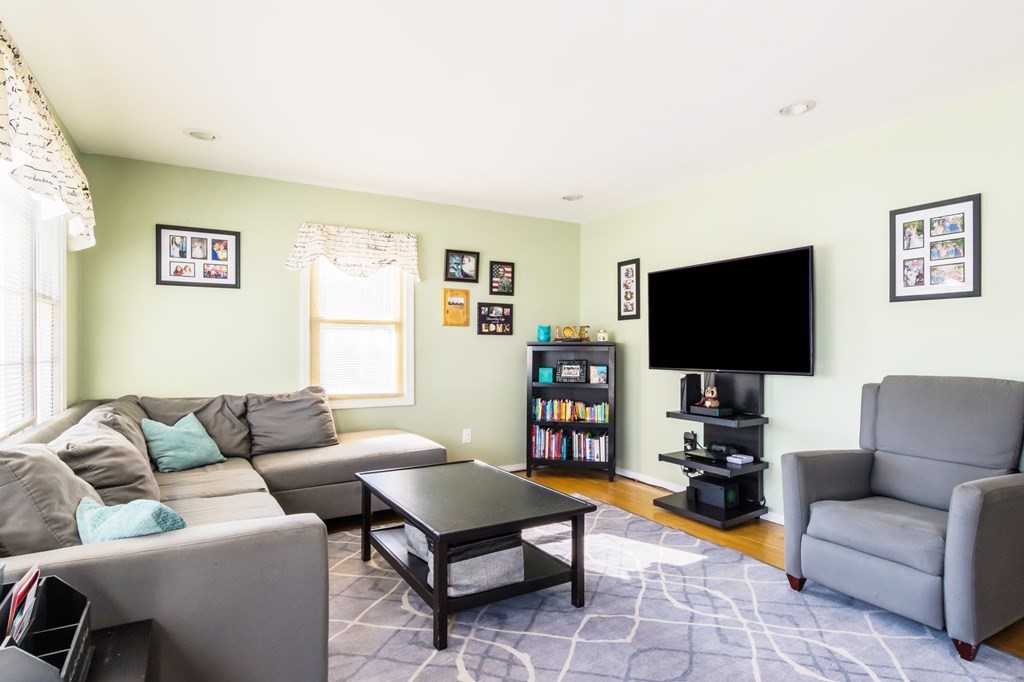 115 Ridgewood Road New Bedford, MA 02745 - Photo 15 of 28 a living room with furniture and a flat screen tv