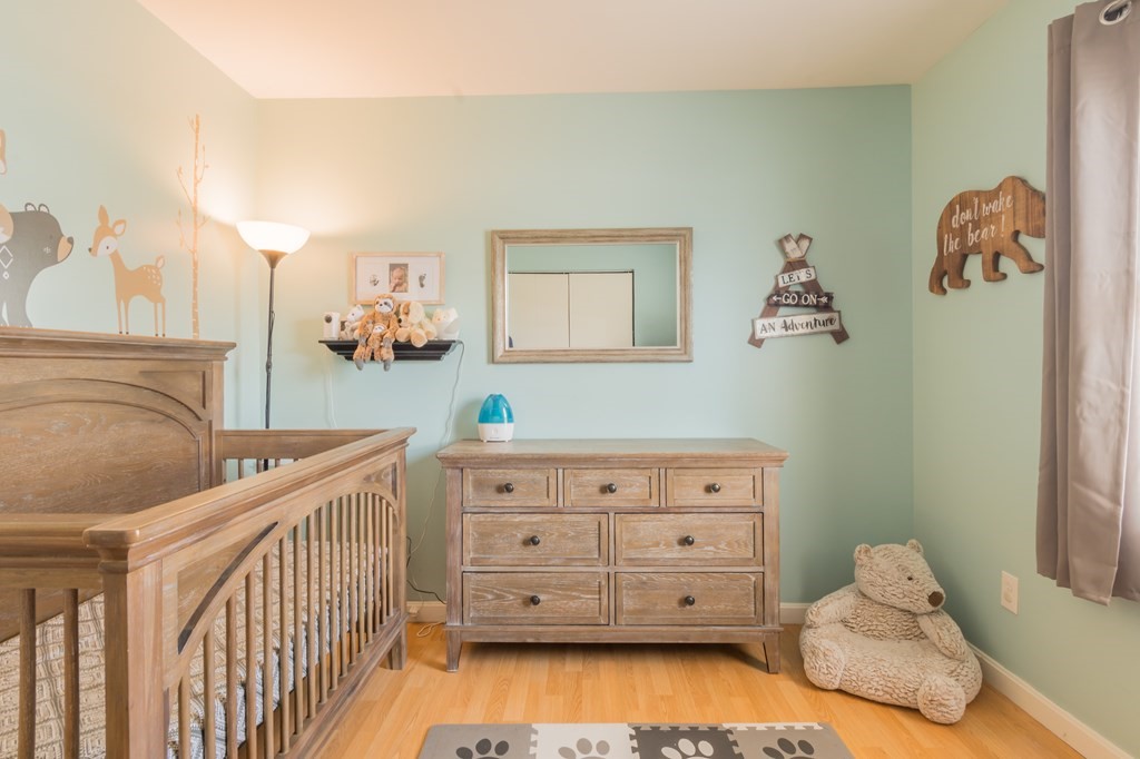 115 Ridgewood Road New Bedford, MA 02745 - Photo 20 of 28 a view of bedroom with furniture and wooden floor