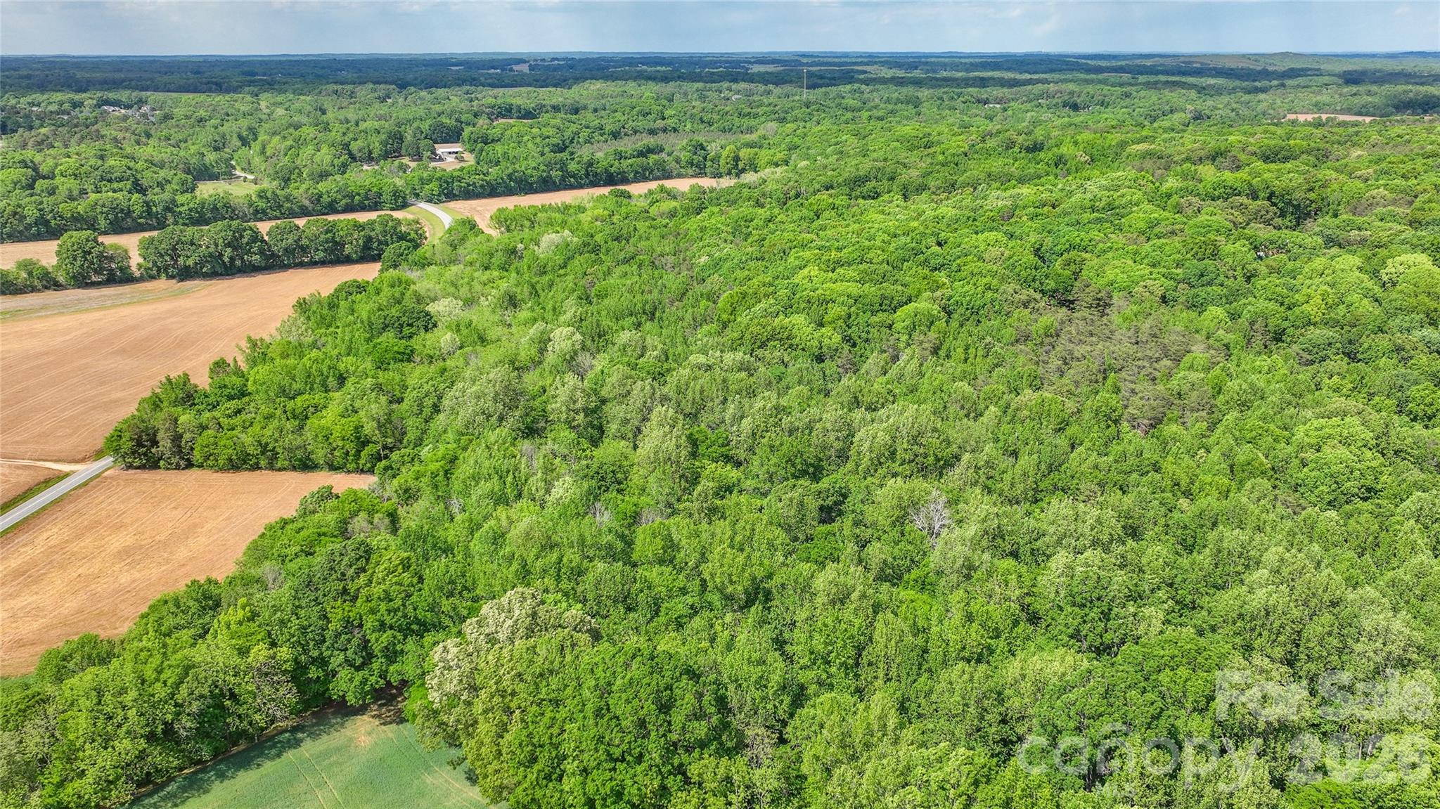 0 McIntyre Road, Unit 1 2 3 4 5 Wingate, NC 28174 - Photo 7 of 25 a view of an outdoor space with a lake view
