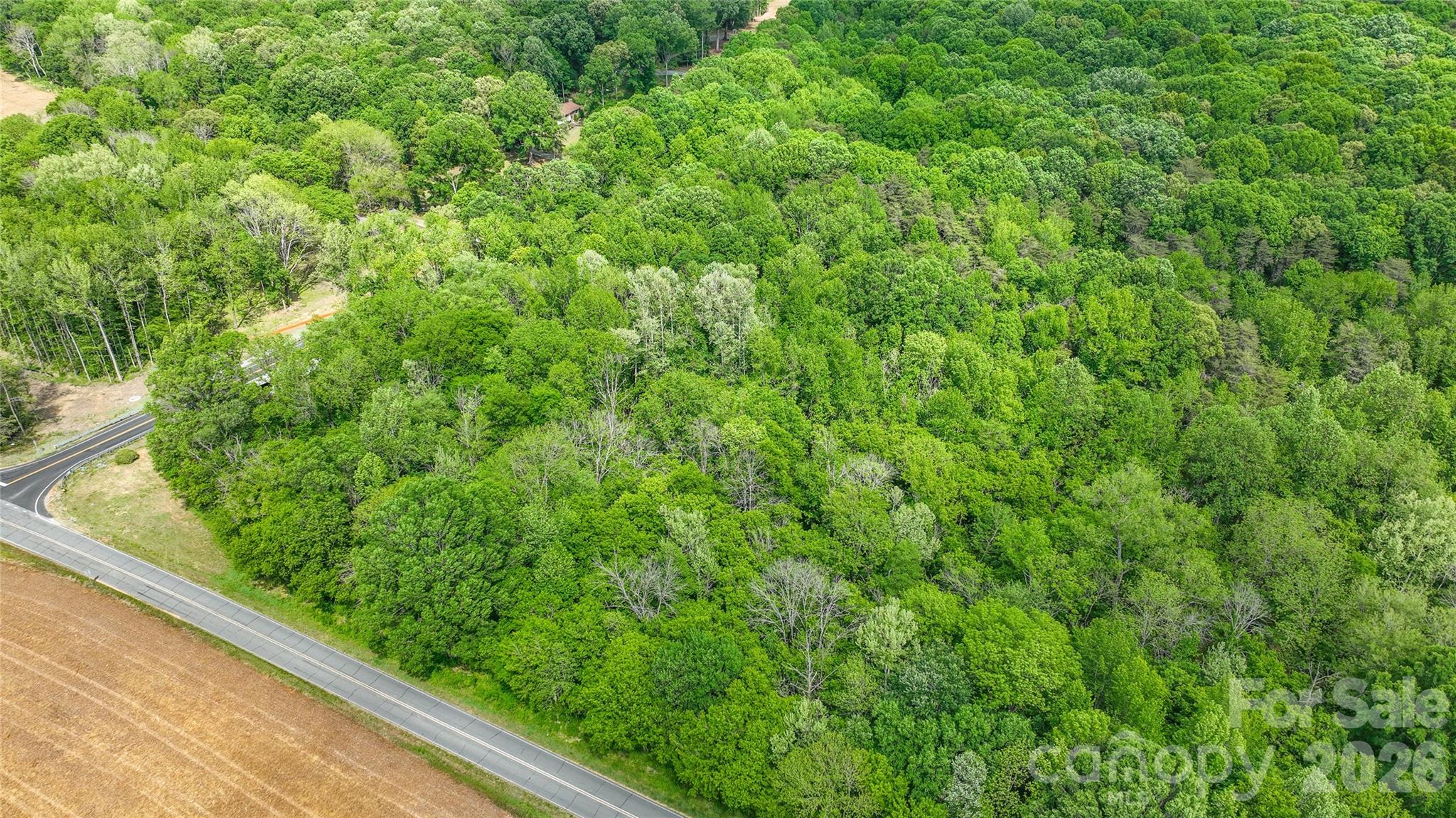 0 McIntyre Road, Unit 1 2 3 4 5 Wingate, NC 28174 - Photo 10 of 25 a view of a green field