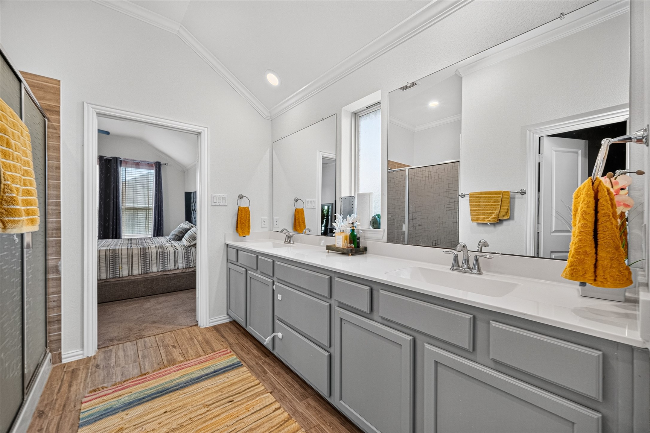 4441 Jessamine Creek Trail Rosharon, TX 77583 - Photo 32 of 42 With its extended vanity, large mirror, and generous storage, the primary bathroom offers plenty of room to get ready without feeling cramped.