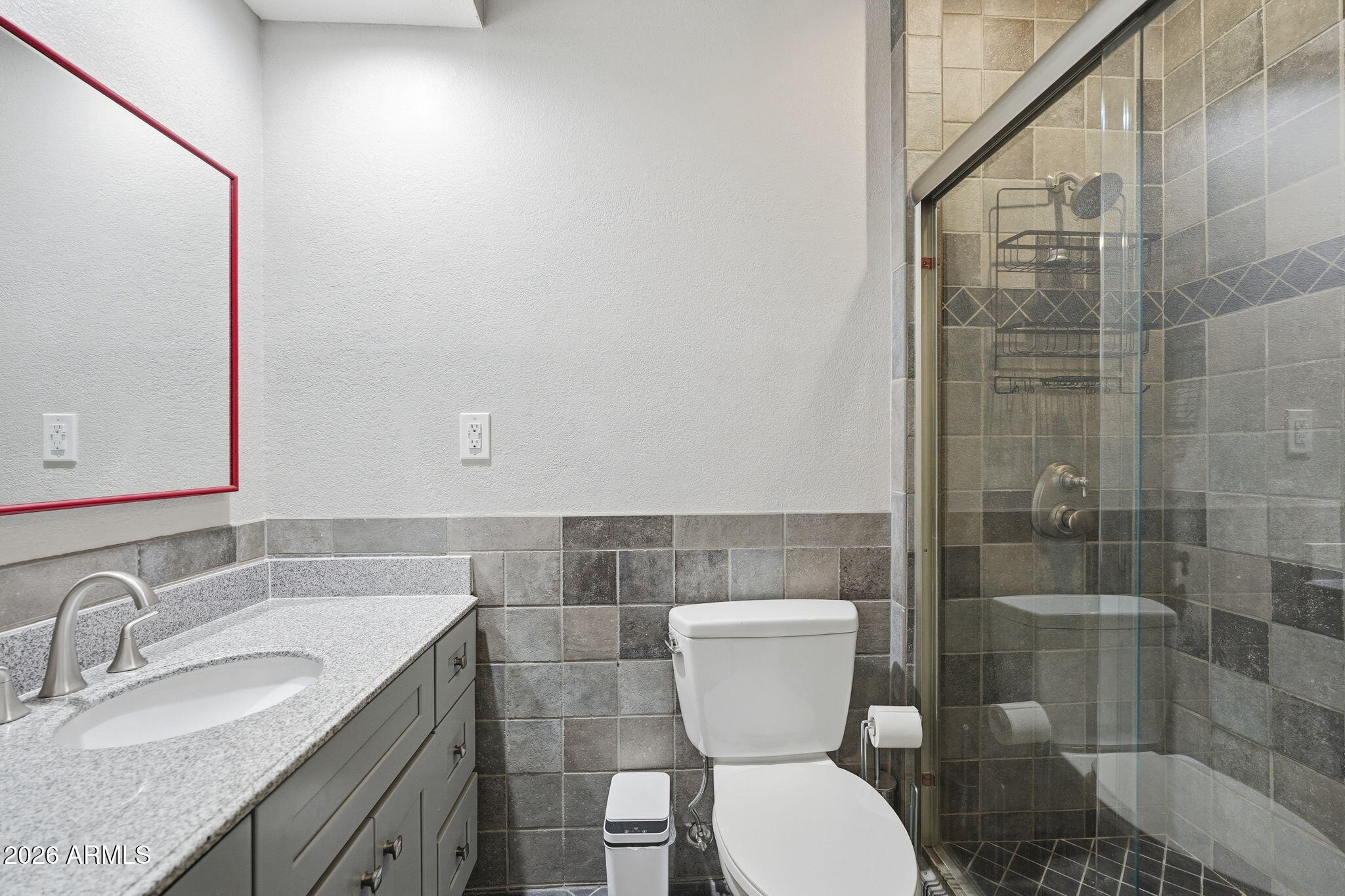 100 East Fillmore Street, Unit 216 Phoenix, AZ 85004 - Photo 15 of 36 a bathroom with a sink and a mirror