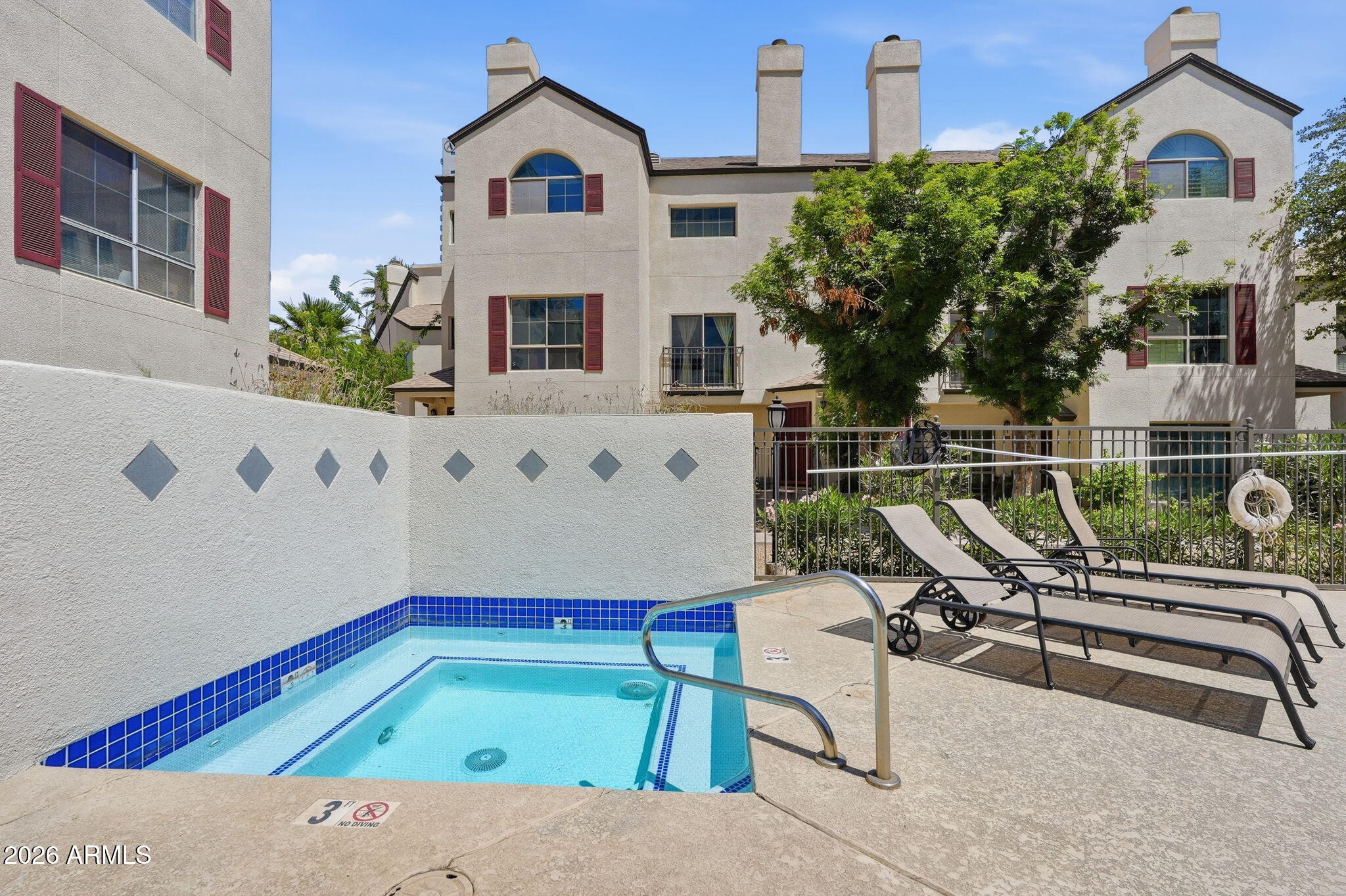 100 East Fillmore Street, Unit 216 Phoenix, AZ 85004 - Photo 23 of 36 a view of a chairs in wooden deck