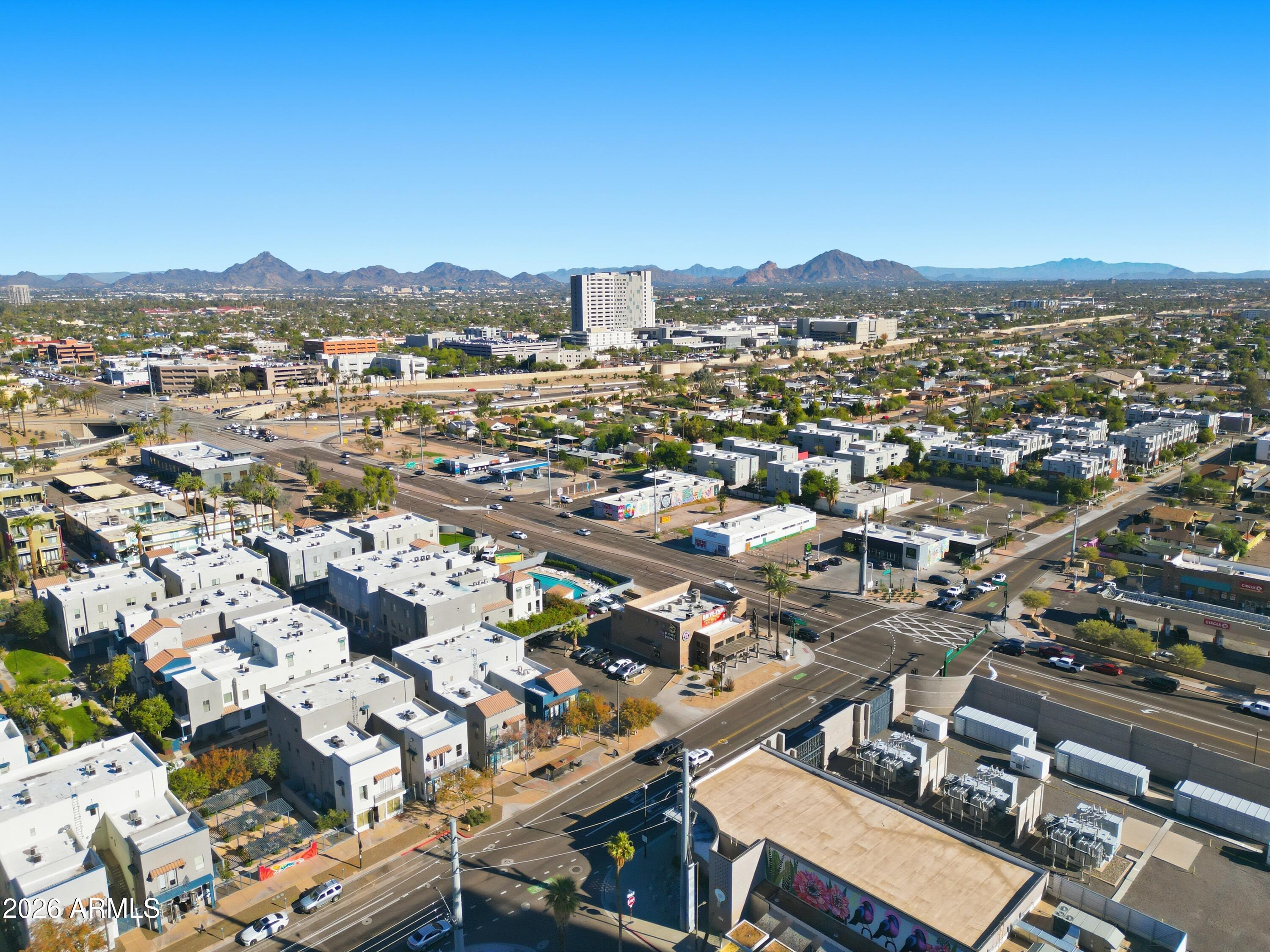 100 East Fillmore Street, Unit 216 Phoenix, AZ 85004 - Photo 28 of 36 an aerial view of a city with lots of residential buildings