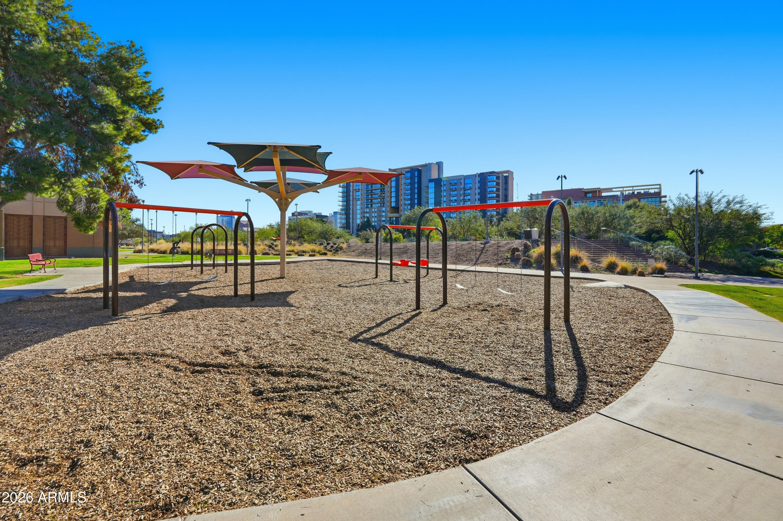 100 East Fillmore Street, Unit 216 Phoenix, AZ 85004 - Photo 34 of 36 a view of a park with swings