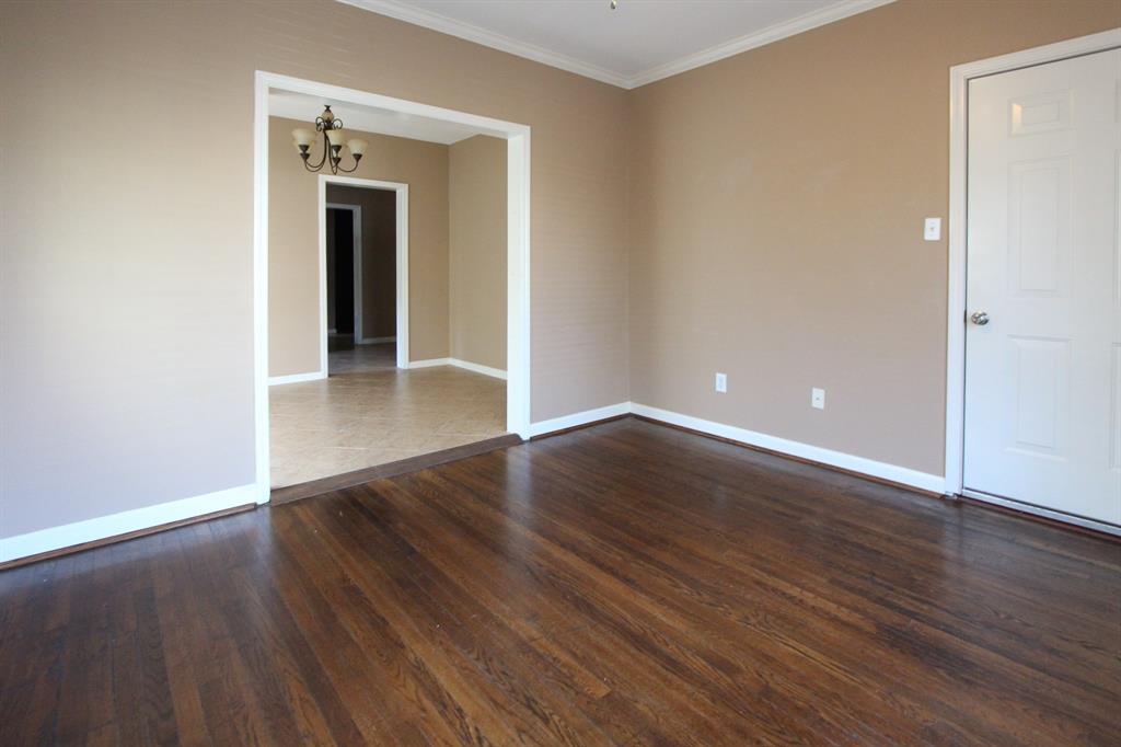 This view of the living room shows the proximity to dining room.
